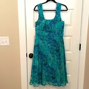 Fully lined, mid-calf length dress